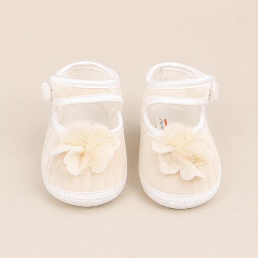Ivory baby booties with flower